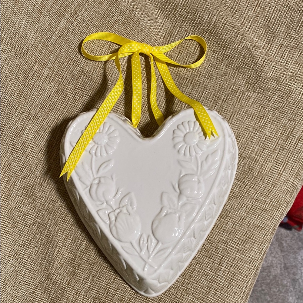 Heart-Shaped Ceramic Wall Decor with Yellow Ribbon